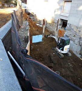 CDATA[
The pattern of suspect construction work and project management at the Coddington Hall renovation project appears to now be in full swing at the old City Hall renovation project.
Exclusive Quincy Quarry photographs indicate that work crews have ripped out work done previously on the planned water cistern between old City Hall and the Hancock Cemetery.
(Quincy Quarry archive photo of one of the many holes in the ground in Quincy Center before actually completed construction work in it was later ripped out, photo left)
As reported previously in Quincy Quarry, the cistern is needed to supply water to the three fountains planned for the $30 million grandiose less than an acre and a half theme park planned by Mayor Koch in front of City Hall but for which funding has yet to be secured.
This latest apparent project redo is also tied to suspected OSHA violations similarly covered by Quincy Quarry see: Safety Violations on City Hall Project?
![Hole in quincy | Quincy News About Quincy Massachusetts | Quincy Ma More holes in the ground in quincy quincy quarry news photo