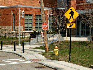 Signage down the street from the Do Not Enter signageA Quincy Quarry  News photo
