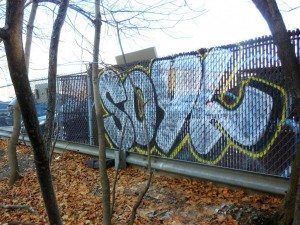 Tagged fence near Quincy Center MBTA station  A Quincy Quarry News photo