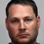 Booking mugshotA Dover Police photo