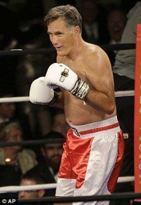 Romey-puts-on-the-gloves-AP-file-photo