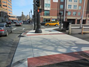 A pedestrian traffic light on a sidewalk - WTQ?A Quincy Quarry News file photo