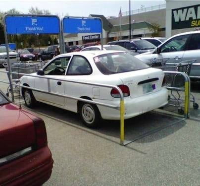Masshole does not mind a few shopping carts in a parking space