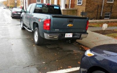 Commuter parking scofflaws already illegally parking before North Quincy MBTA station lost half of its parking