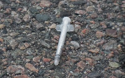 Quincy High School needled by needle