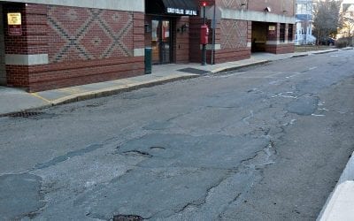 Quincy Center cover-up painted over