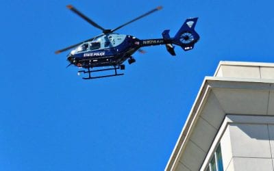 State Police helicopter rooftop response near Quincy Center T Station