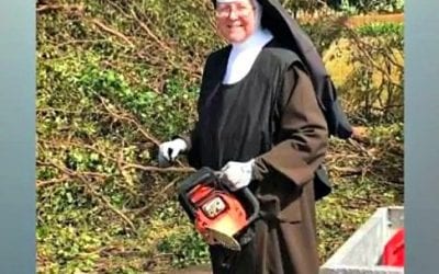 Chainsaw packing nun lays waste to dead wood