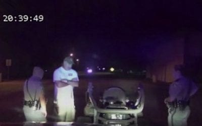 Mayor pulled over while driving a riding lawn mower with an open beer