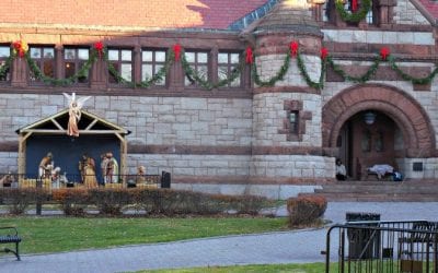 Next to a manger and no bed for a crib