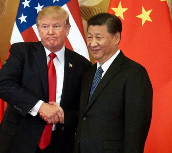 President Trump refuses to take questions from reporters during China visit and so bowing to Chinese pressure?