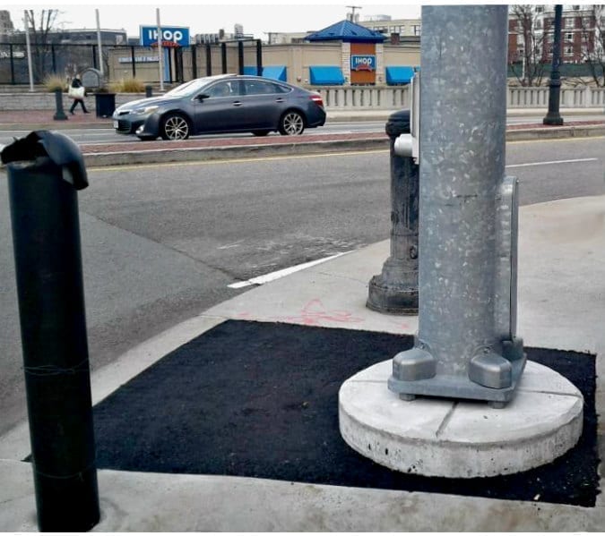 Quincy Quarry coverage finally forces traffic light sidewalk fix?