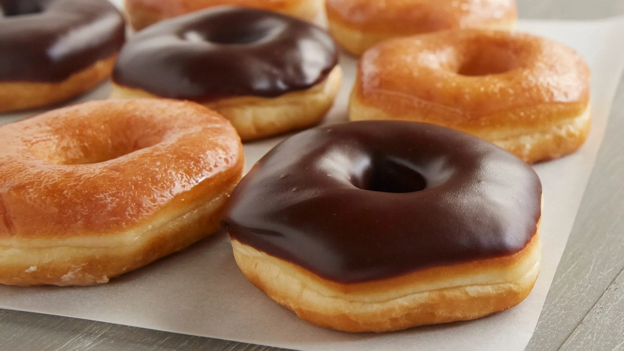 National Doughnut Day 2019: Where to Score Freebies and Deals Today! cab0e137-7830-430c-a3fa-8e5ab3c4b5ff-RaceTrac_National_Doughnut_Day_6-7_GlazedChocGlazed_Donuts_34x12_053_-_Hannah_Van_Malssen-3