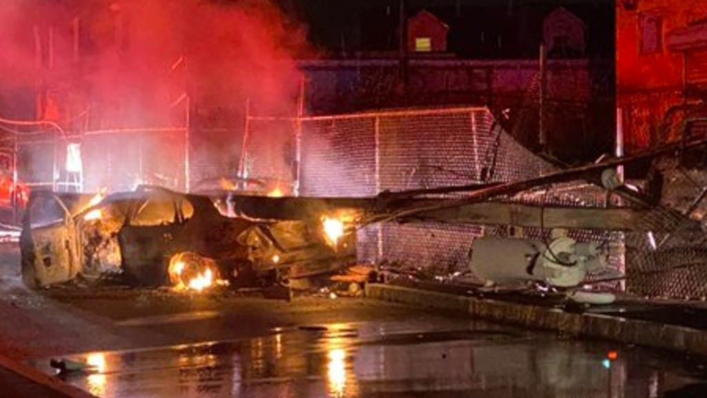 Boston driver “miraculously” escapes before car bursts into flames