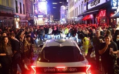 Arrests made as revelers defy distancing rules after pubs reopen in England