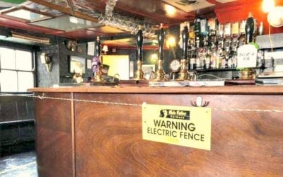 British Pub landlord installs electric fence around bar