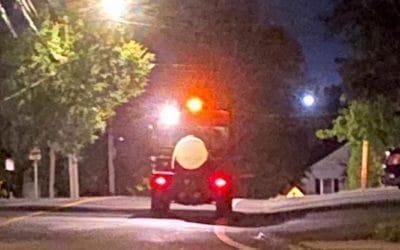 Unmarked mini-tractor exposéd spraying weeds under cover of darkness in Quincy Center