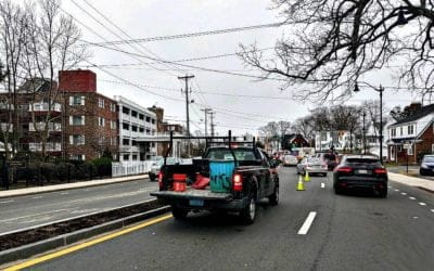 Natural Resources Department truck kochblocks morning commute on Sea Street