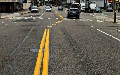 Quincy institutes vehicular play chicken traffic lanes on Adams Street?