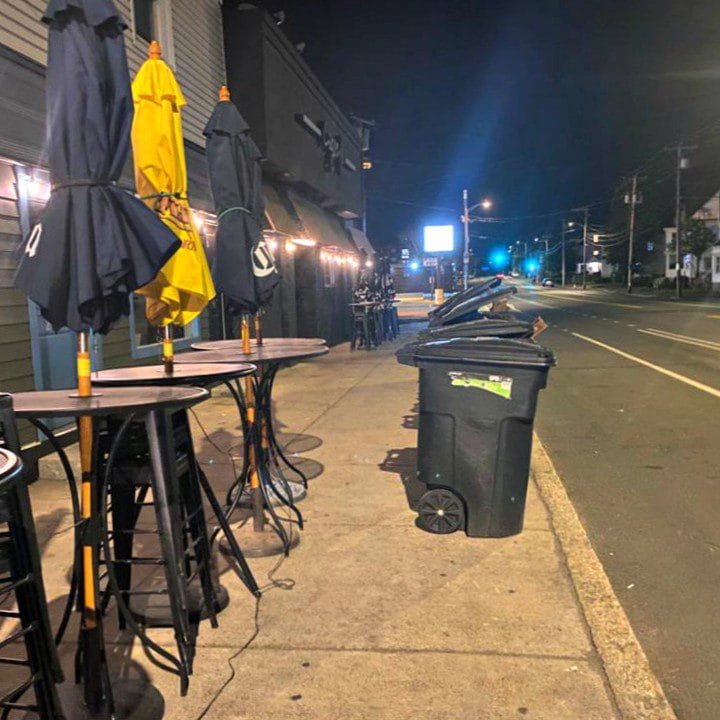 Quincy News Quincy restaurant trash blocking Washington Street