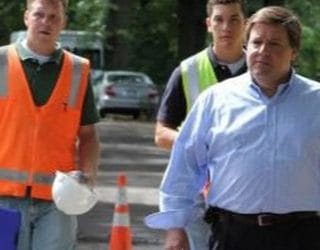 Quincy Mayor Thomas P. Koch goes on a walking tour of his neighborhood to finally reach out to the local Asian community