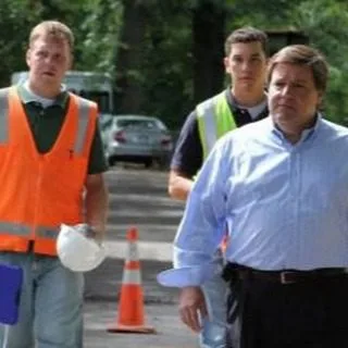 Quincy Mayor Thomas P. Koch goes on a walking tour of his neighborhood to finally reach out to the local Asian community