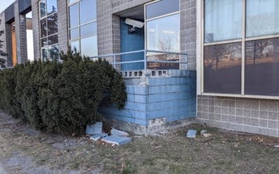 City of Quincy Public Buildings Department falling down on taking care of falling bricks at Quincy police headquarters